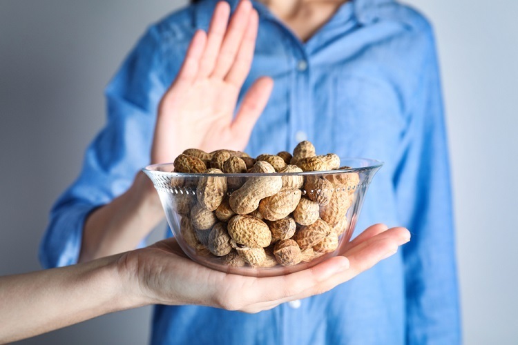 What action should be taken if a customer indicates that they have a nut allergy? nut allergy